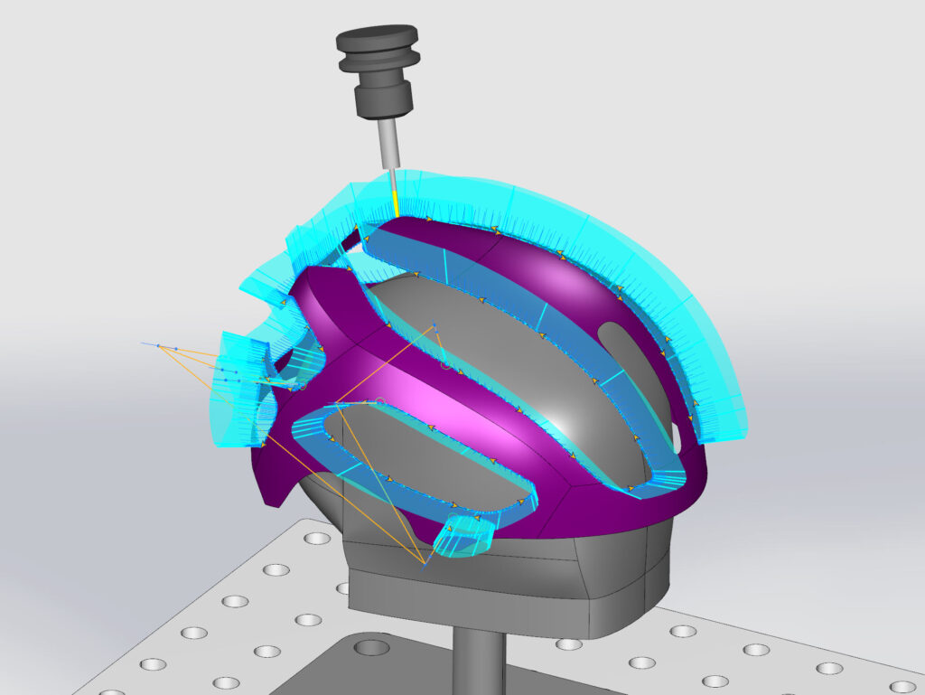 Complex contouring toolpath for a helmet workpiece, created using Robotmaster's CAM module.