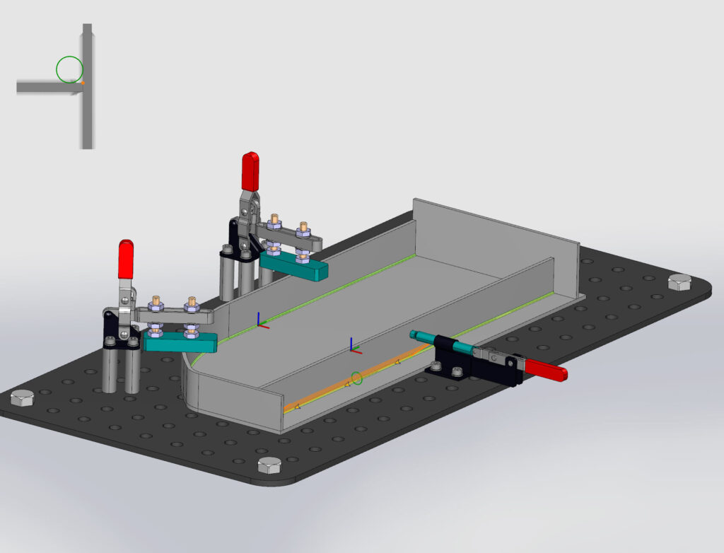 Robotmaster demonstrates rolling ball welding between two clamped metal sheets, showcasing obstacle avoidance and push/pull control for weld bead placement.